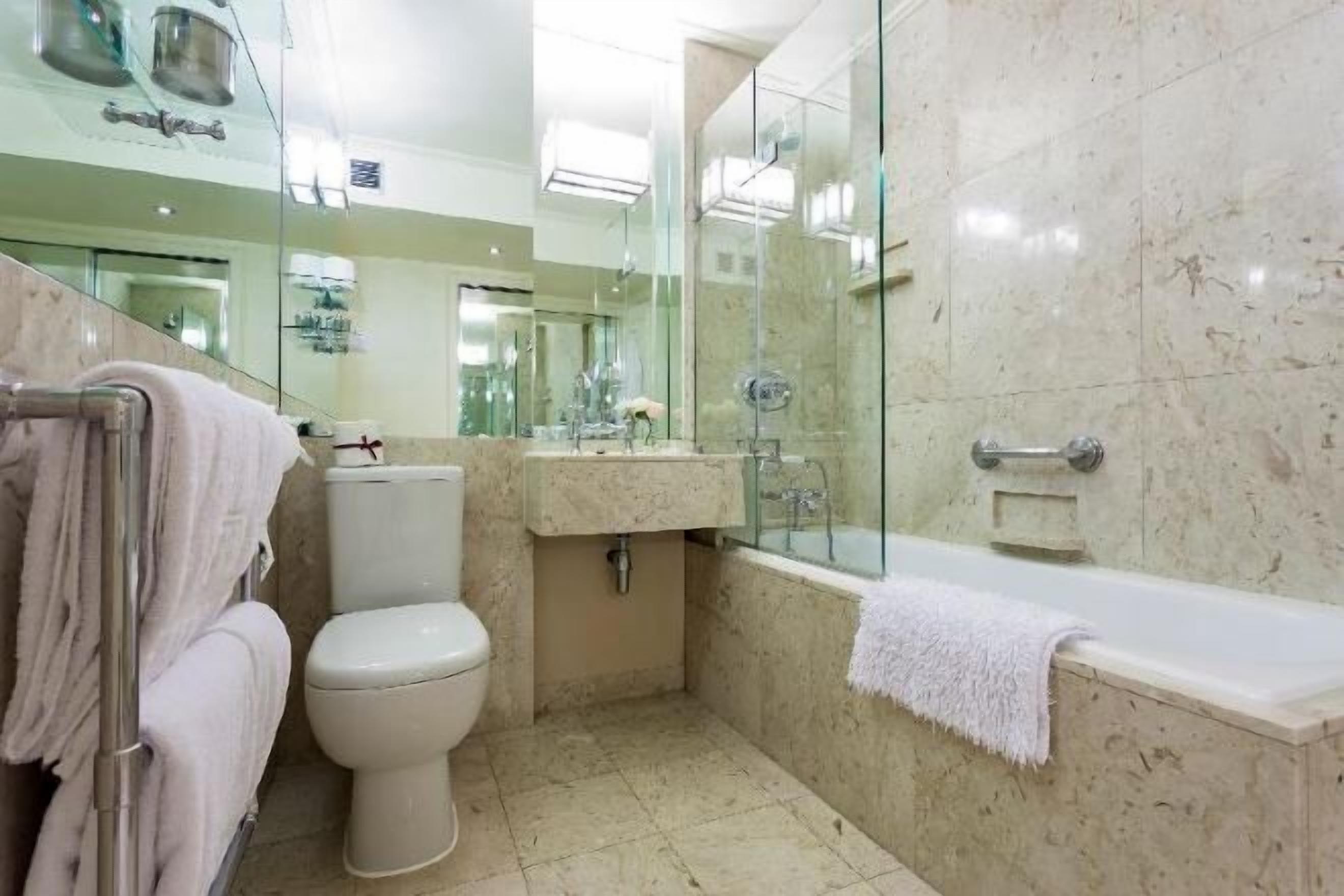 Bathroom | Combined shower/tub, designer toiletries, hair dryer, bathrobes