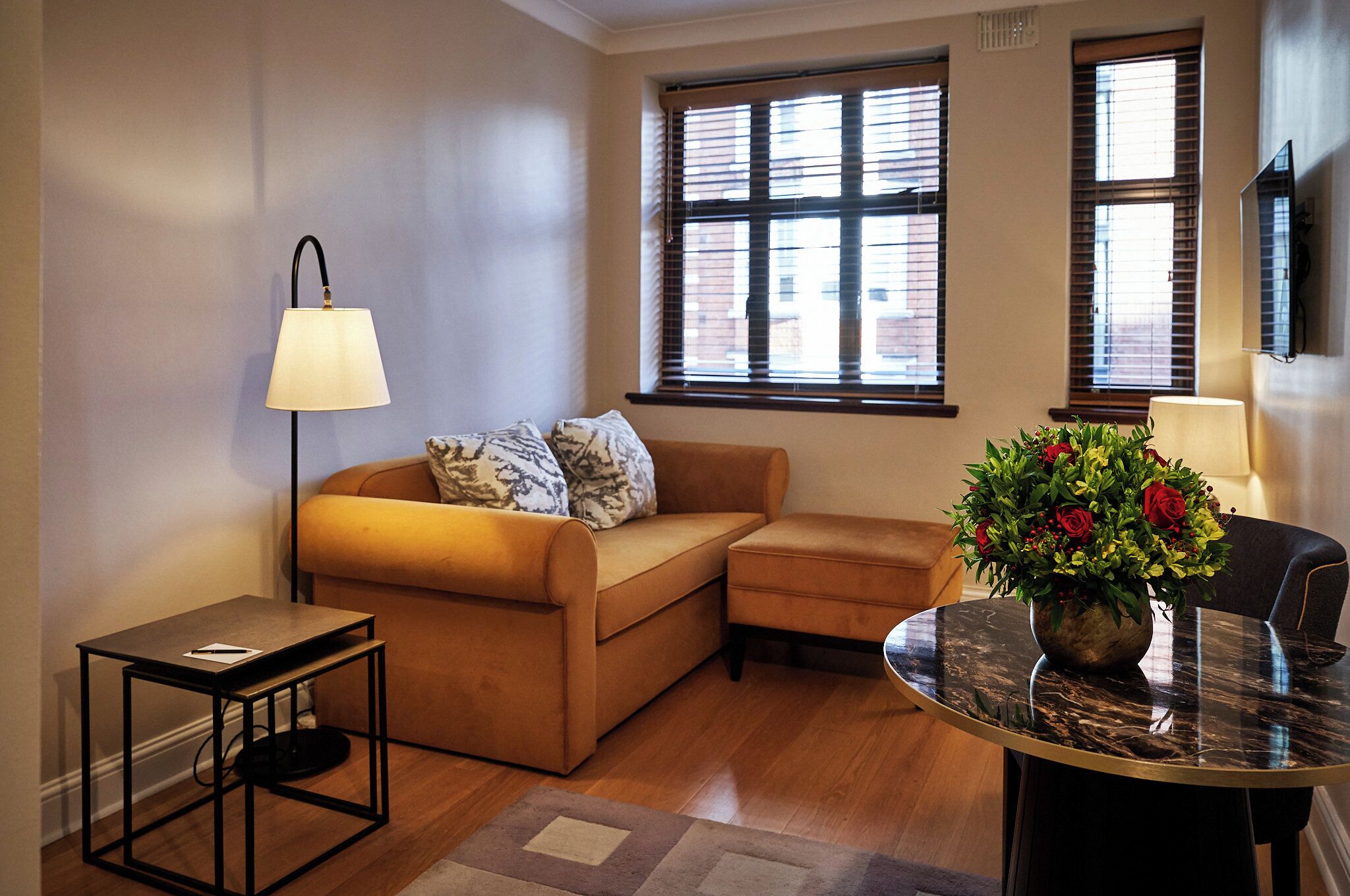 one bedroom apartment | living area | 42-inch smart tv with satellite channels