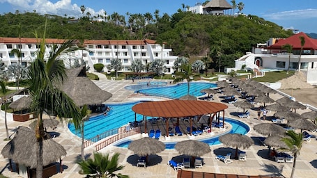 Outdoor pool, open 9:00 AM to 7:00 PM, pool umbrellas. Los Angeles Locos - All Inclusive