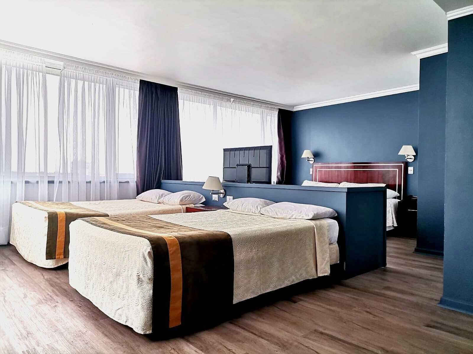 executive triple room | minibar, in-room safe, individually decorated, individually furnished
