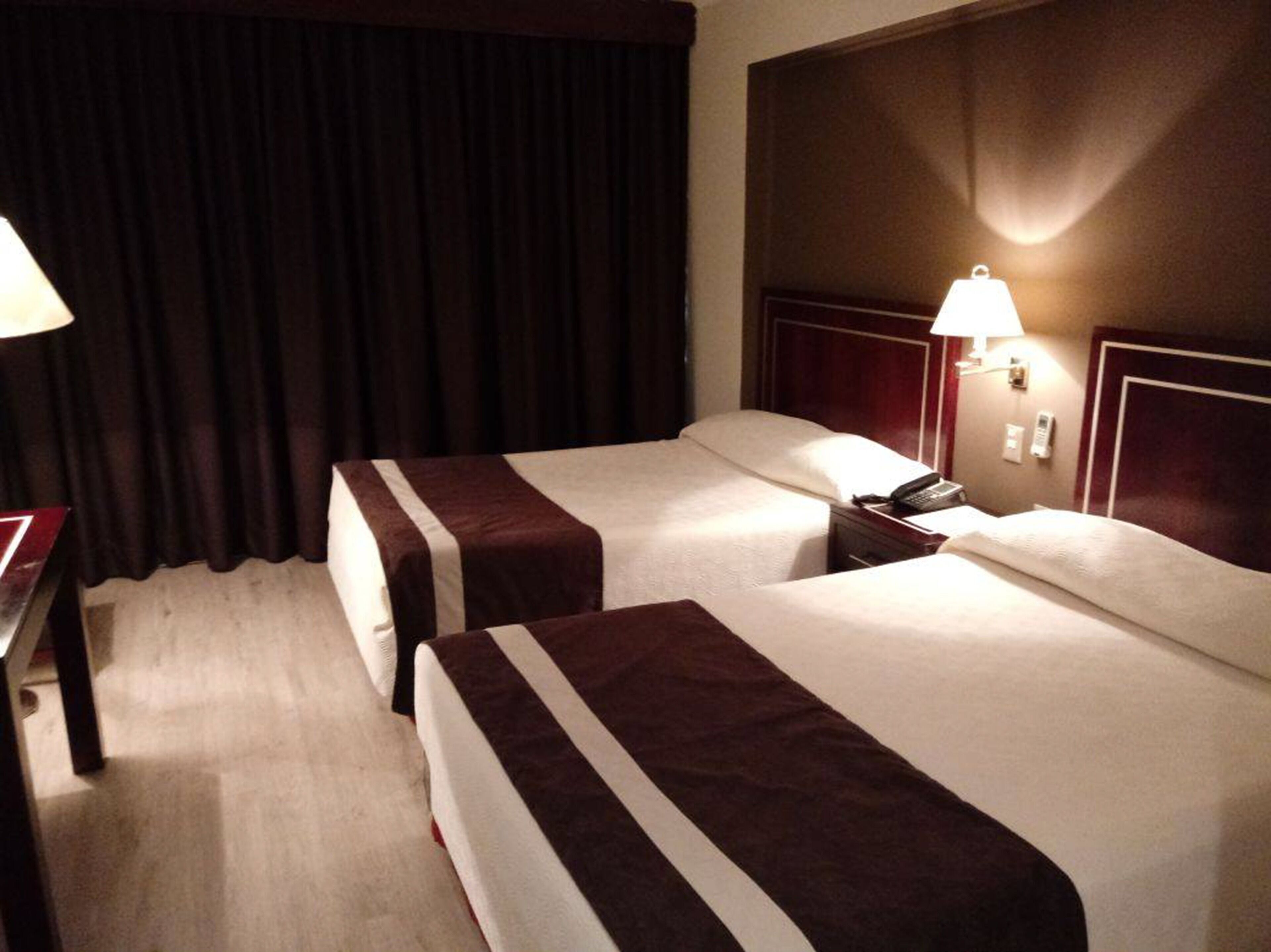 Minibar, safe på rommet, individuelt dekorert og individuelt innredet