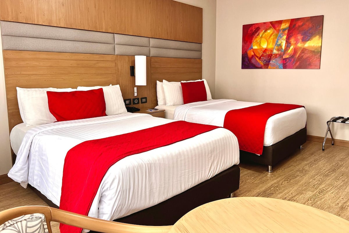 Ropa de cama hipoalergénica y minibar 