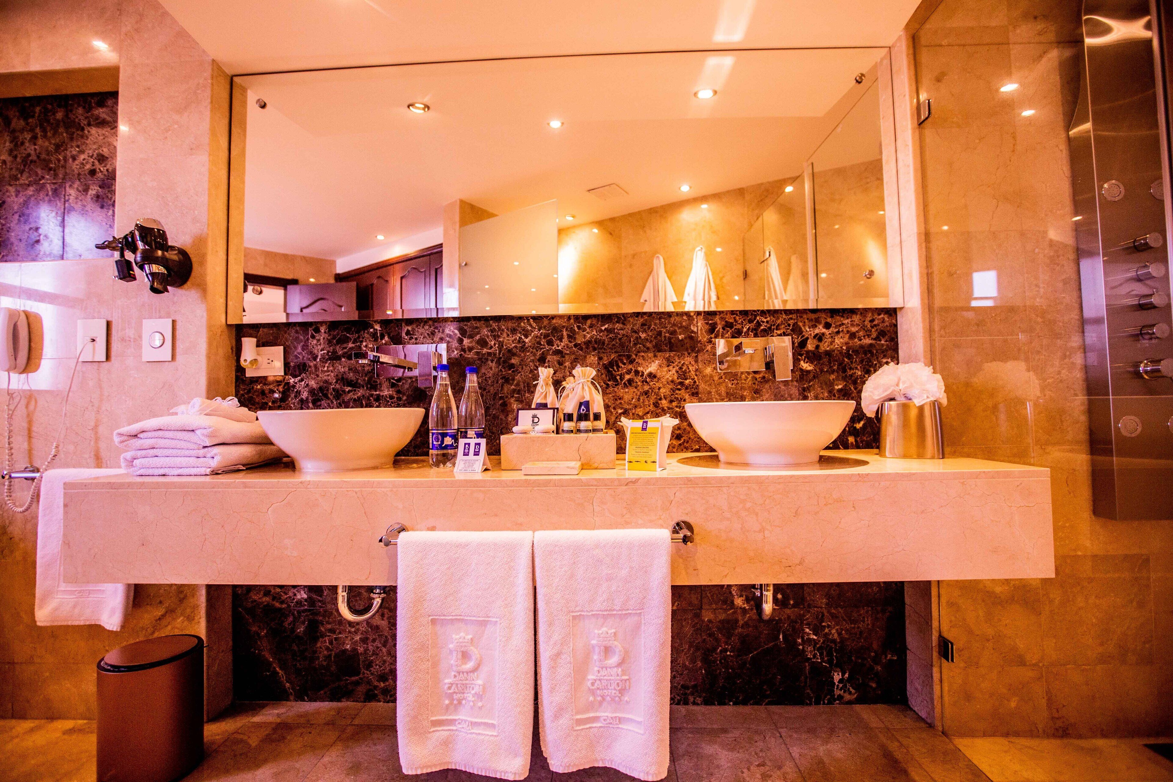 suite with balcony | bathroom sink