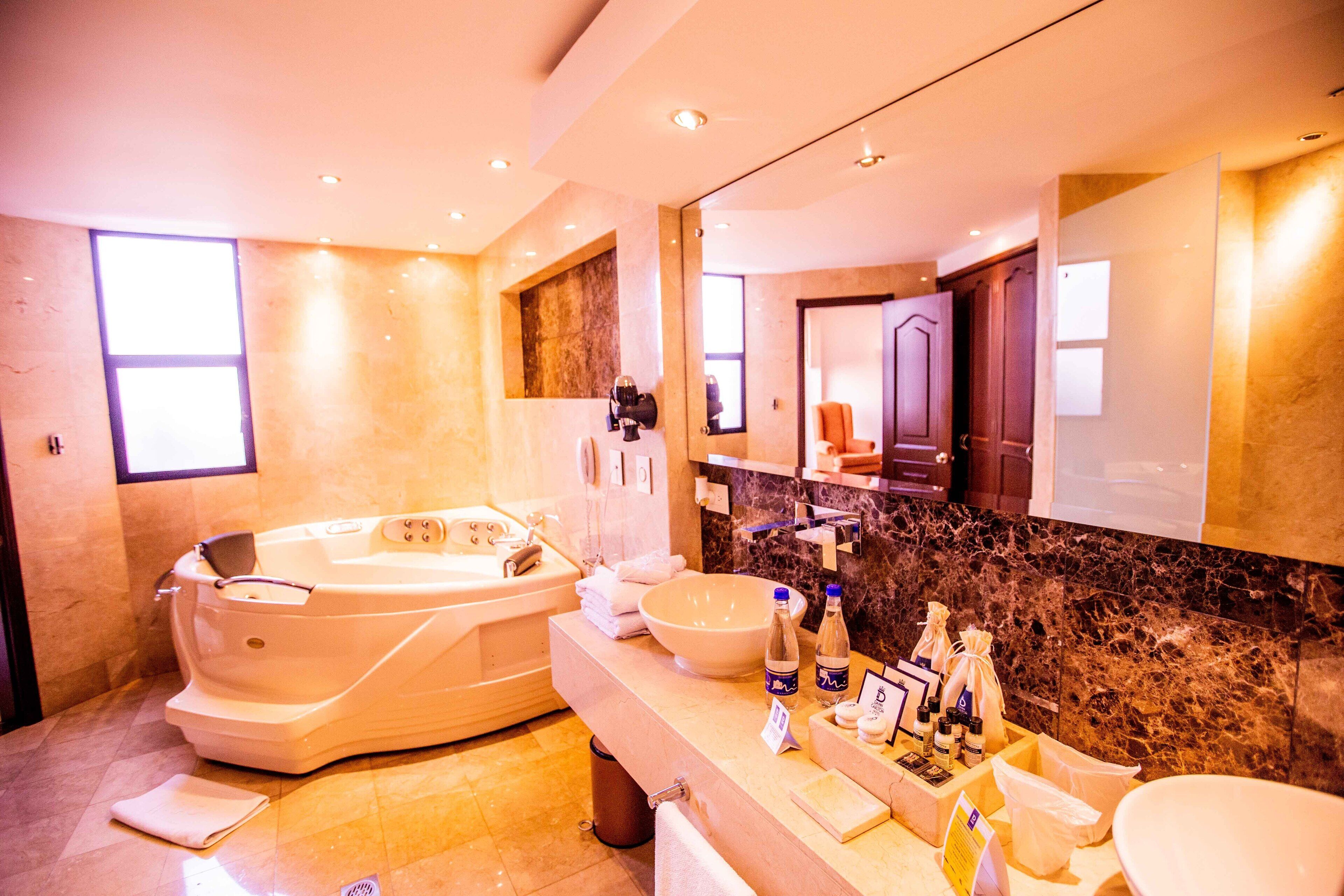 suite with balcony | jetted bathtub