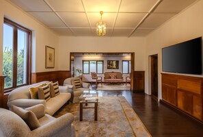 Presidential Villa, 3 Bedrooms | Living area | 32-inch LCD TV with cable channels, TV, fireplace