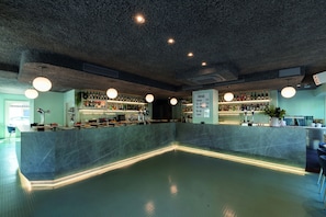 Breakfast, lunch, dinner served; alfresco dining