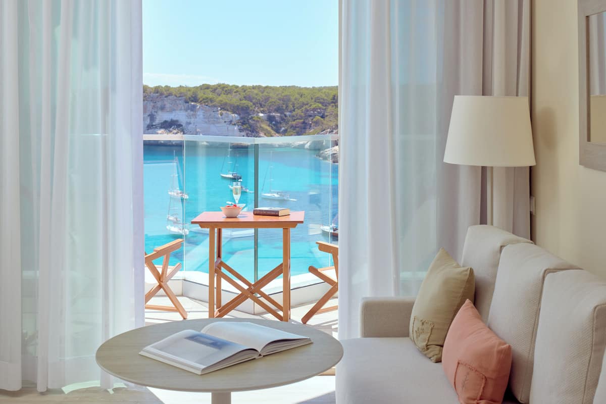 the level suite cala galdana | in-room safe, desk, laptop workspace, iron/ironing board
