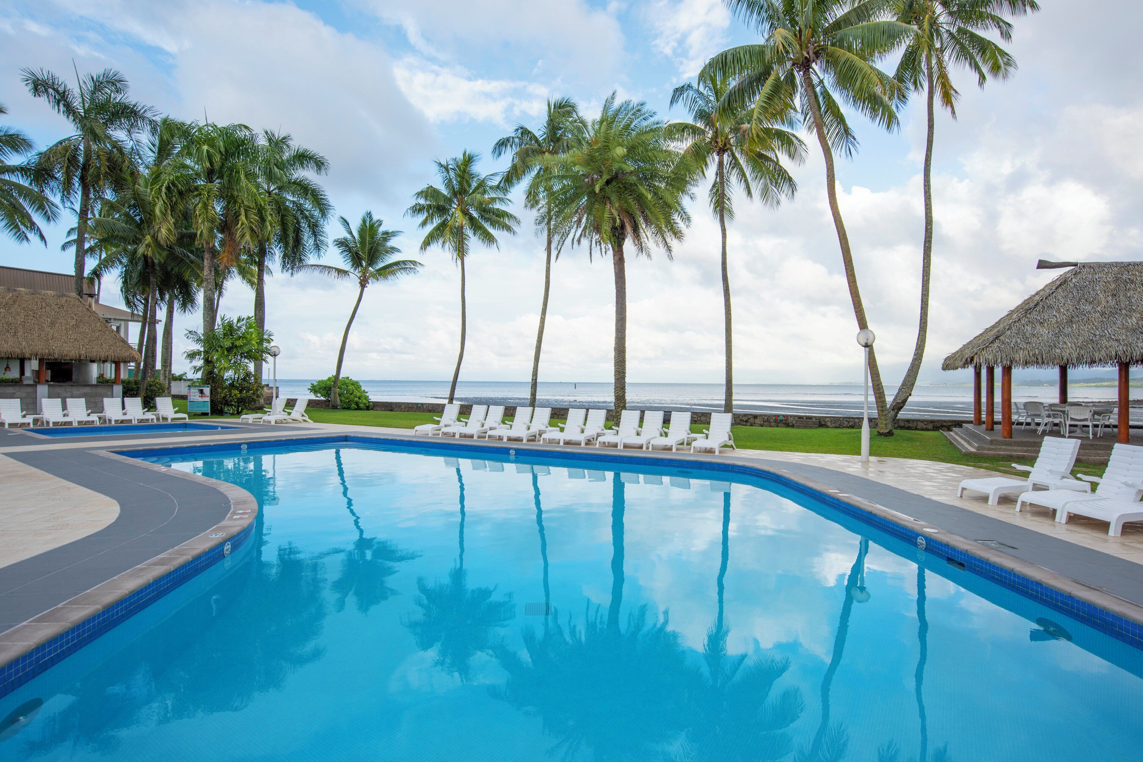 Outdoor pool, open 6:00 AM to 7:00 PM, pool umbrellas, pool loungers