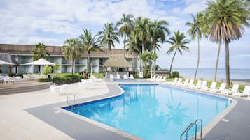 Outdoor pool, open 6:00 AM to 7:00 PM, pool umbrellas, pool loungers