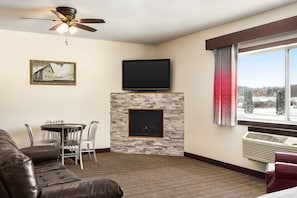Studio Suite, 1 King Bed, Non Smoking | Individually decorated, individually furnished, desk, iron/ironing board