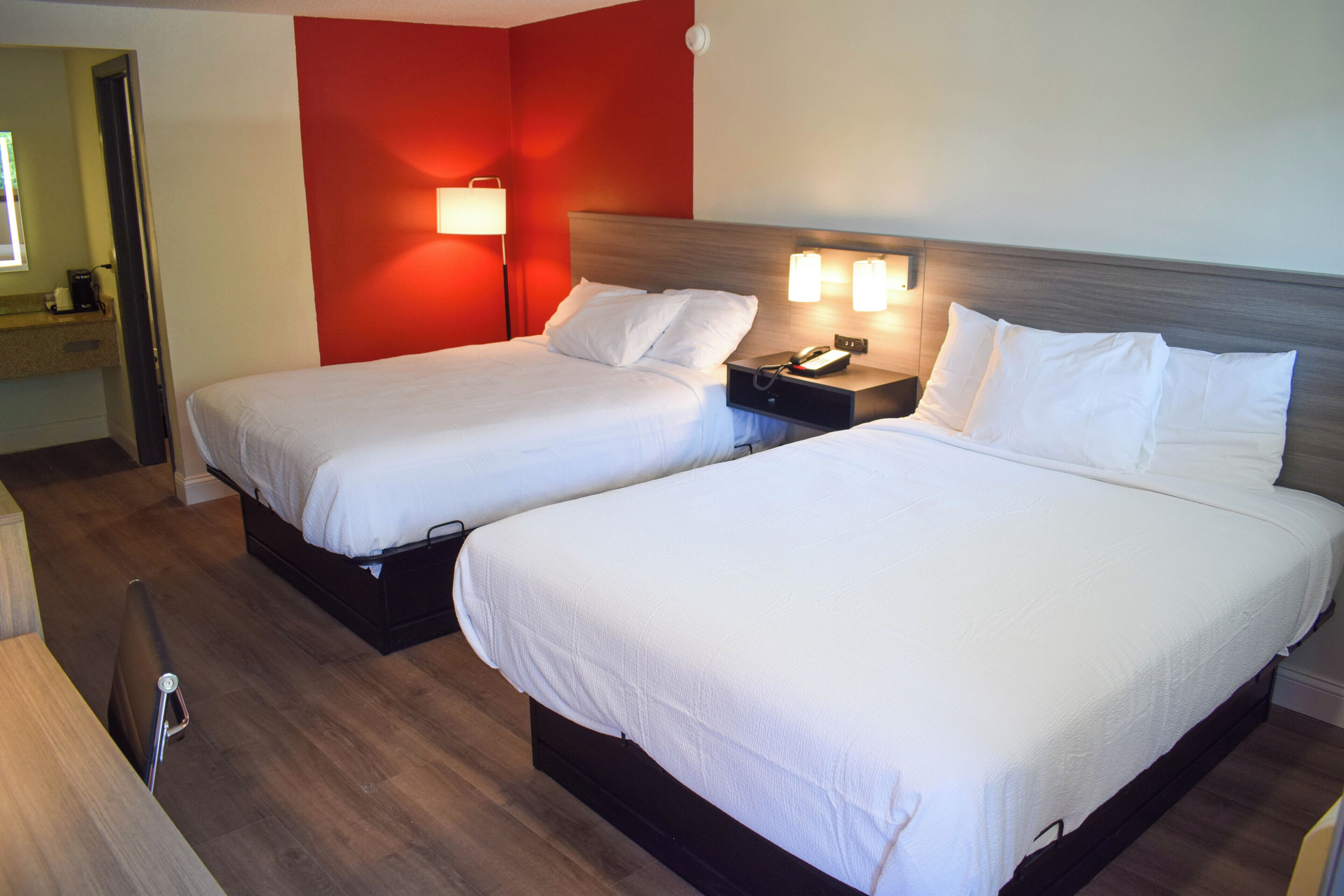 deluxe room, 2 queen beds, non smoking | 1 bedroom, desk, soundproofing, iron/ironing board