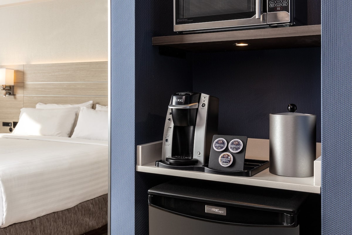Hypo-allergenic bedding, pillow-top beds, in-room safe, desk