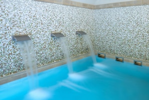 Indoor pool, open 7:00 AM to 9:00 PM, pool loungers