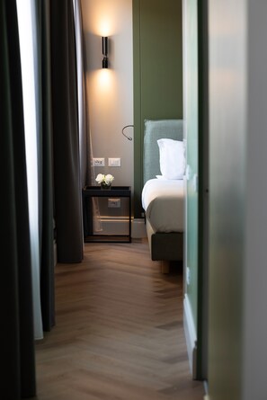 Hypoallergeen beddengoed, een minibar, een kluis op de kamer