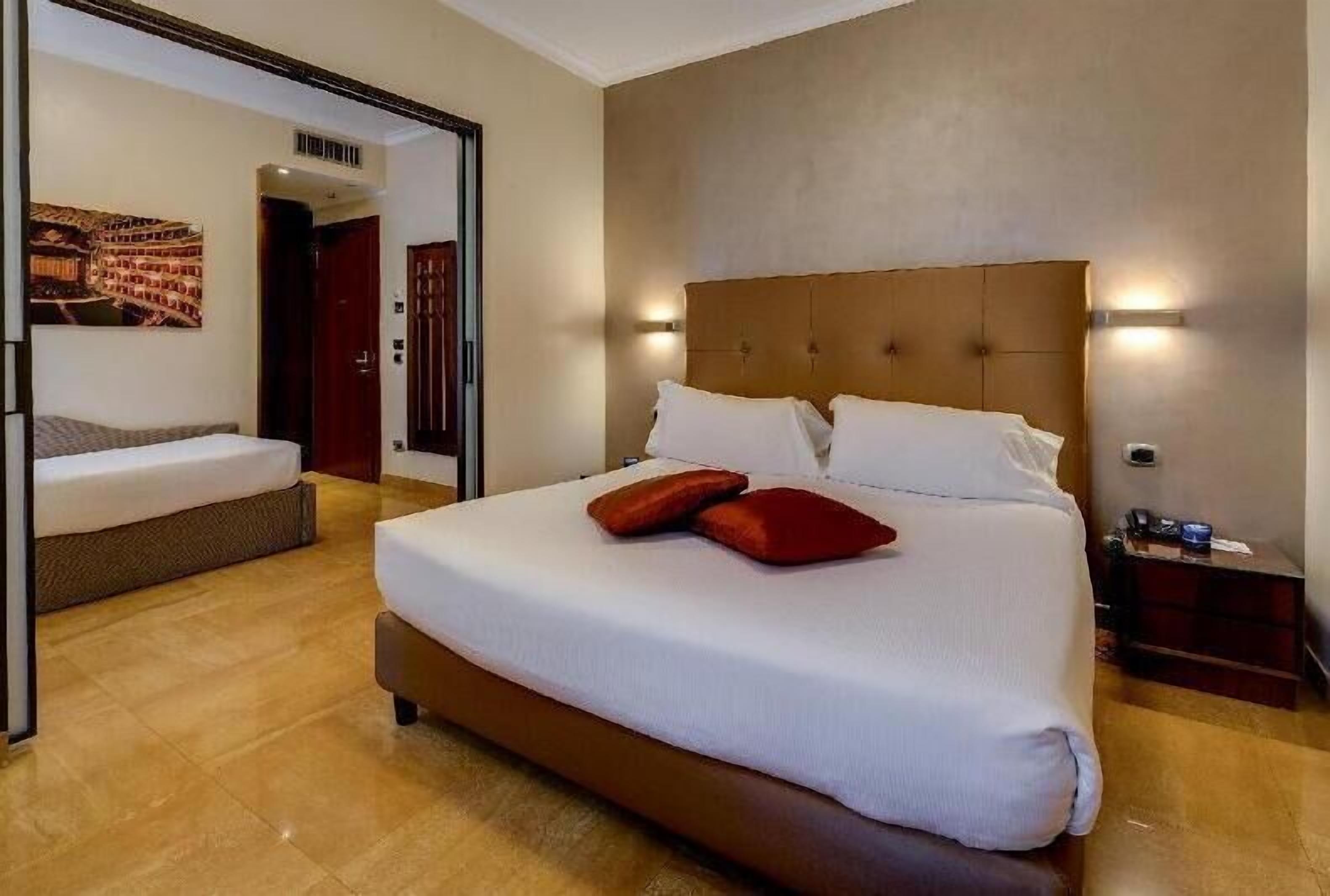 Hypo-allergenic bedding, minibar, in-room safe, individually decorated