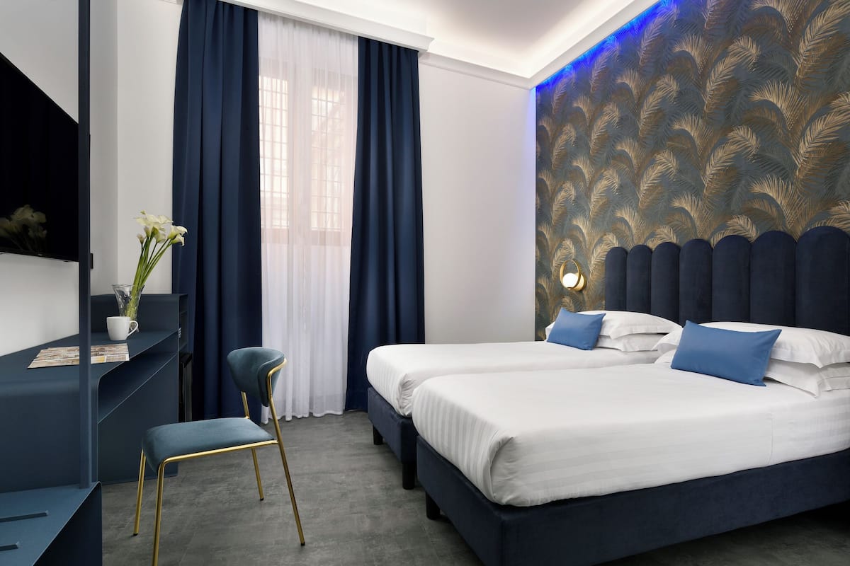 Hypo-allergenic bedding, minibar, in-room safe, soundproofing