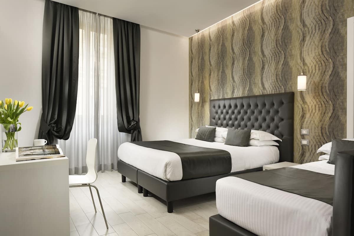 Hypo-allergenic bedding, minibar, in-room safe, soundproofing