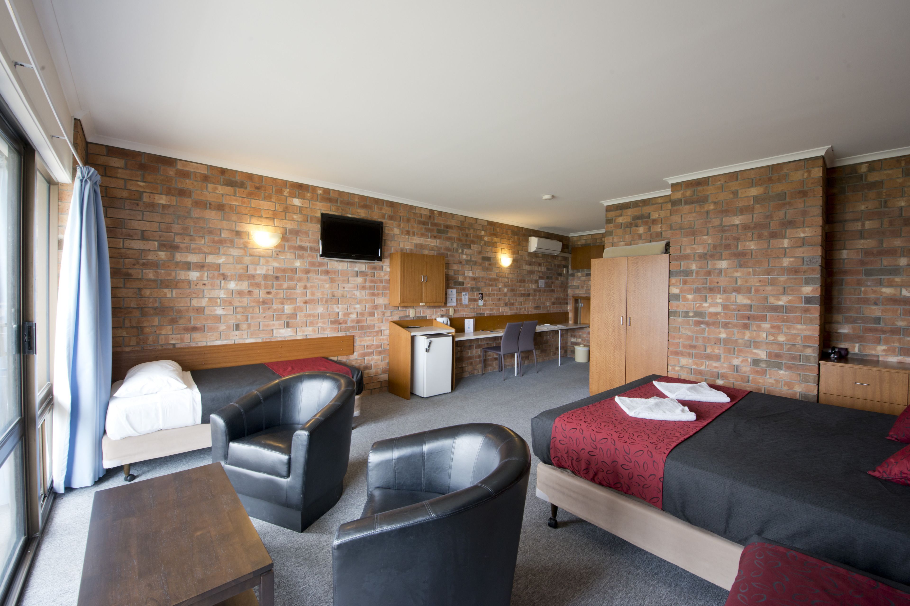 superior room, 1 king and 2 single beds | desk, iron/ironing board, free wifi, bed sheets