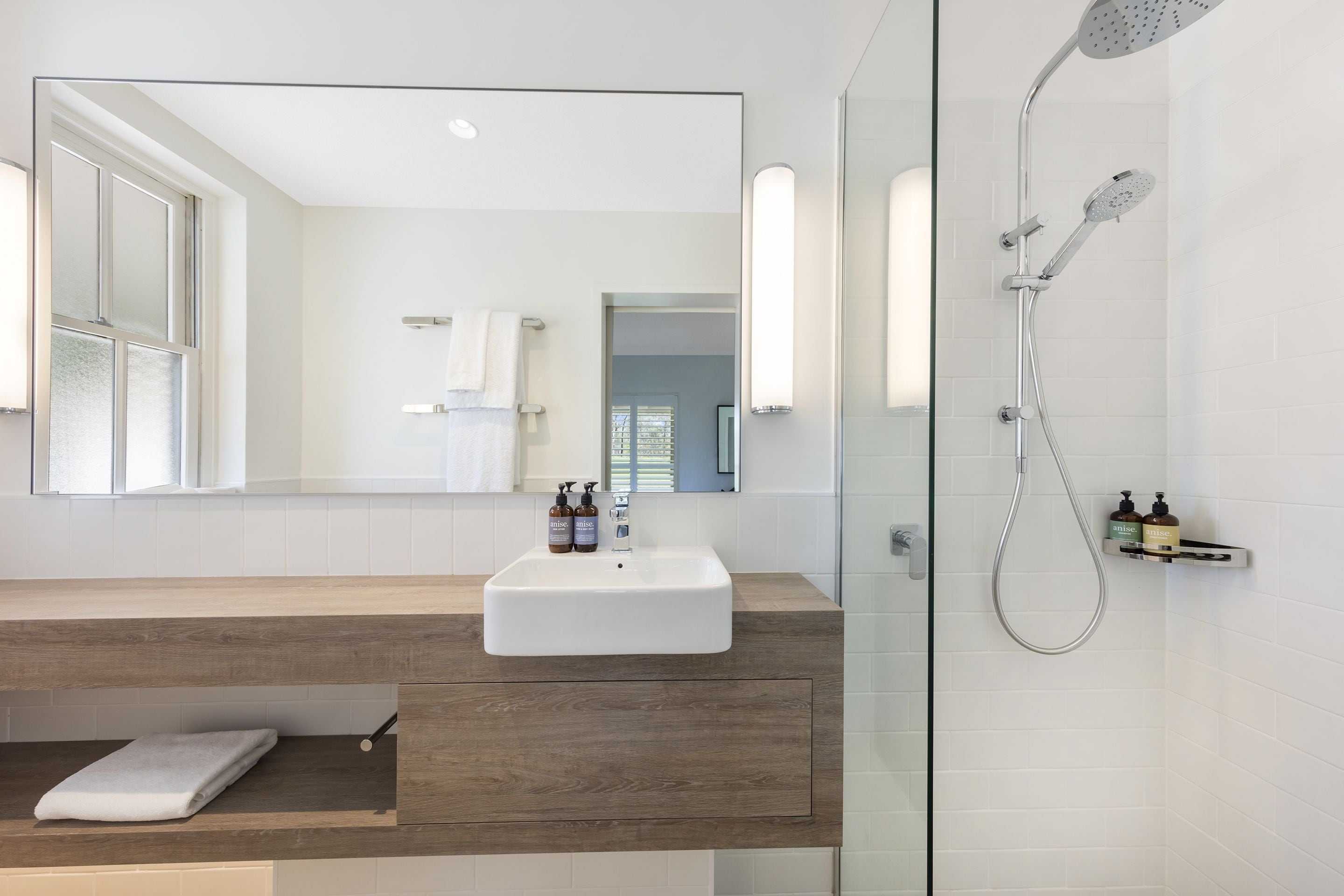 shower, rainfall showerhead, designer toiletries, hair dryer