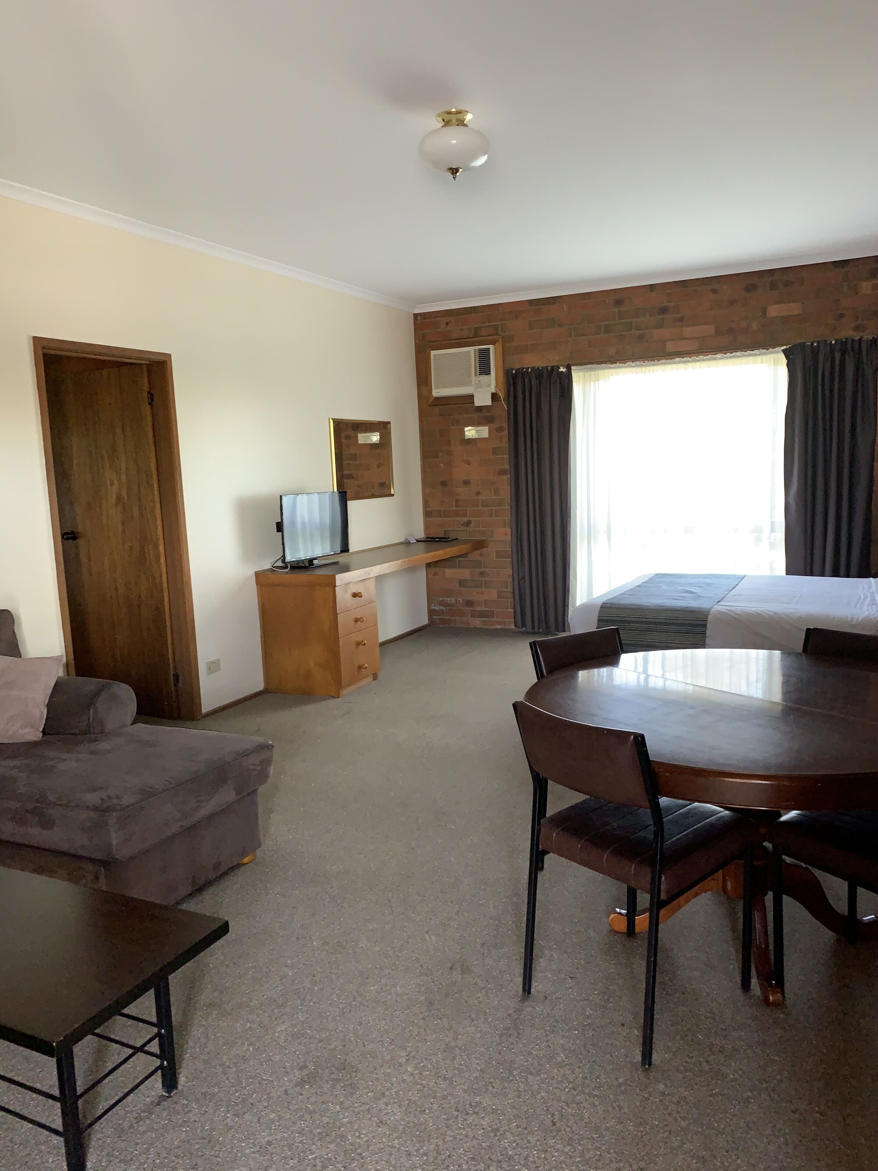 Standard Suite, 2 Bedrooms | Living area | TV, DVD player