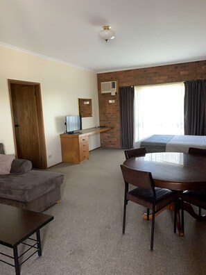 Standard Suite, 2 Bedrooms | Living area | TV, DVD player - Federation Motel Resort (Corowa)