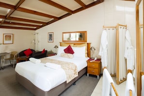Premium bedding, desk, iron/ironing board, free cots/infant beds