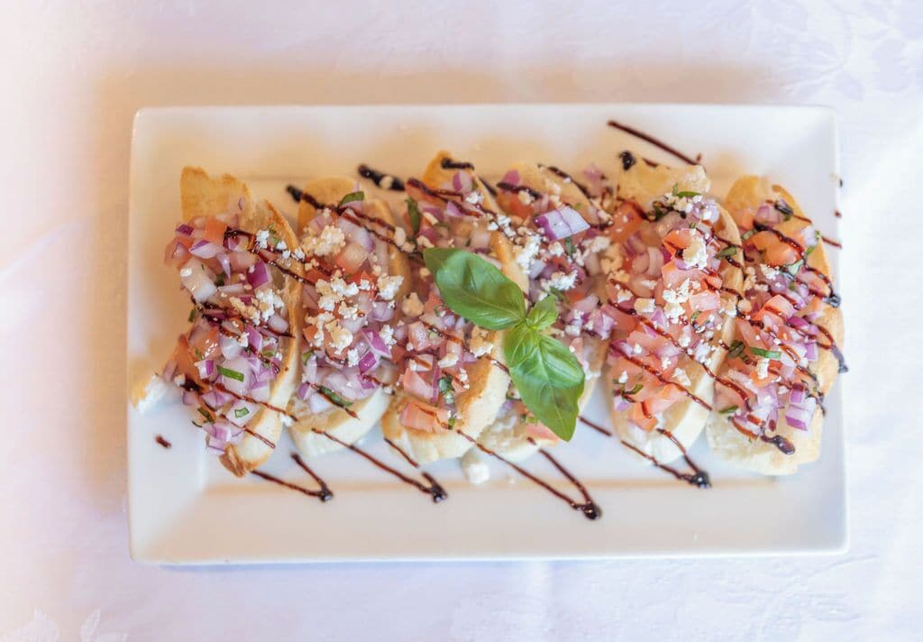 A rectangular plate with food items.