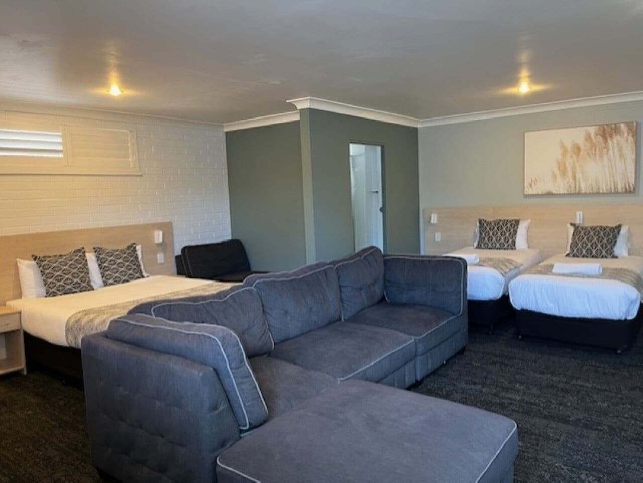 Family Suite, 1 Bedroom, Non Smoking, Kitchenette (Large Family Room) | Desk, laptop workspace, iron/ironing board, free WiFi