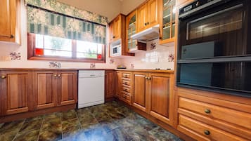 Apartament, 2 dormitoris (Self Contained) | Cuina privada | Frigorífic, microones, bullidora elèctrica i torradora