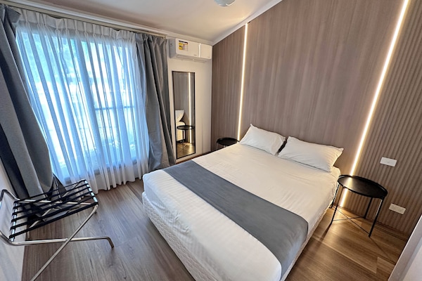 Family Suite, 1 Bedroom | Iron/ironing board, WiFi (free), bed sheets