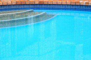 Outdoor pool, open 9:00 AM to 8:00 PM, pool umbrellas, sun loungers