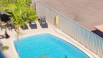 Outdoor pool, pool umbrellas, pool loungers