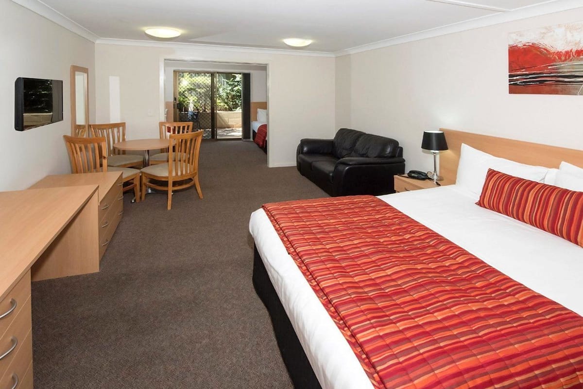 family room | premium bedding, pillow-top beds, minibar, in-room safe