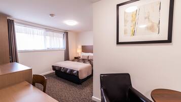 Minibar, desk, iron/ironing board, bed sheets