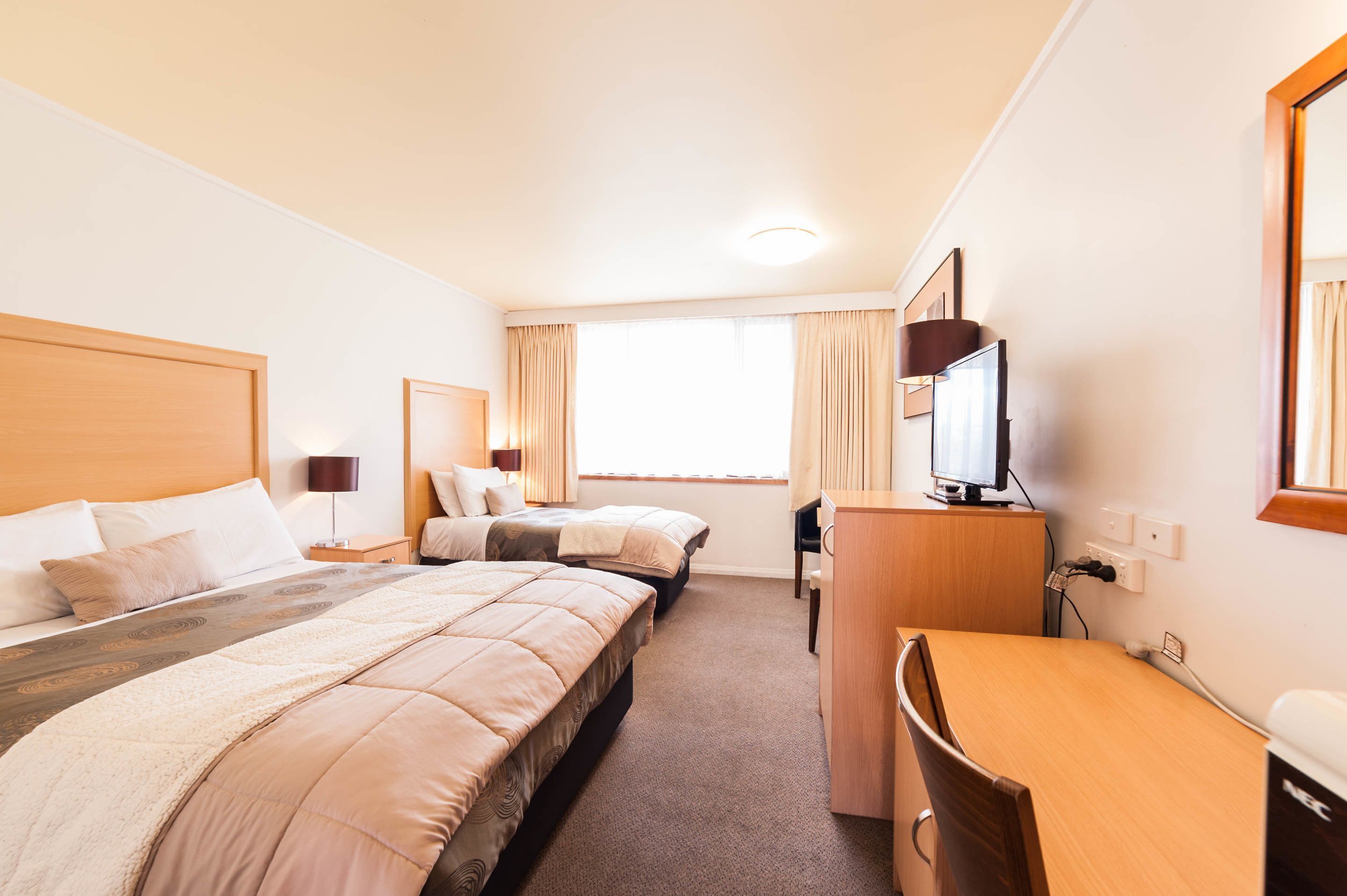 Minibar, desk, iron/ironing board, bed sheets