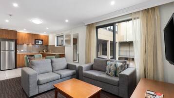 Suite, 1 King Bed, Non Smoking | In-room safe, soundproofing, iron/ironing board, free WiFi