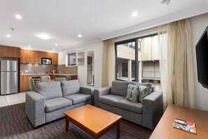 Suite, 1 King Bed, Non Smoking | In-room safe, soundproofing, iron/ironing board, free WiFi