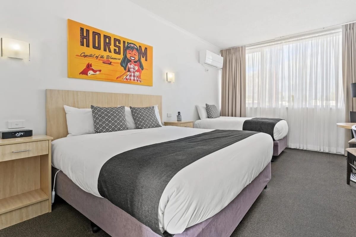 Camera Deluxe | Minibar, una scrivania, tende oscuranti, ferro/asse da stiro