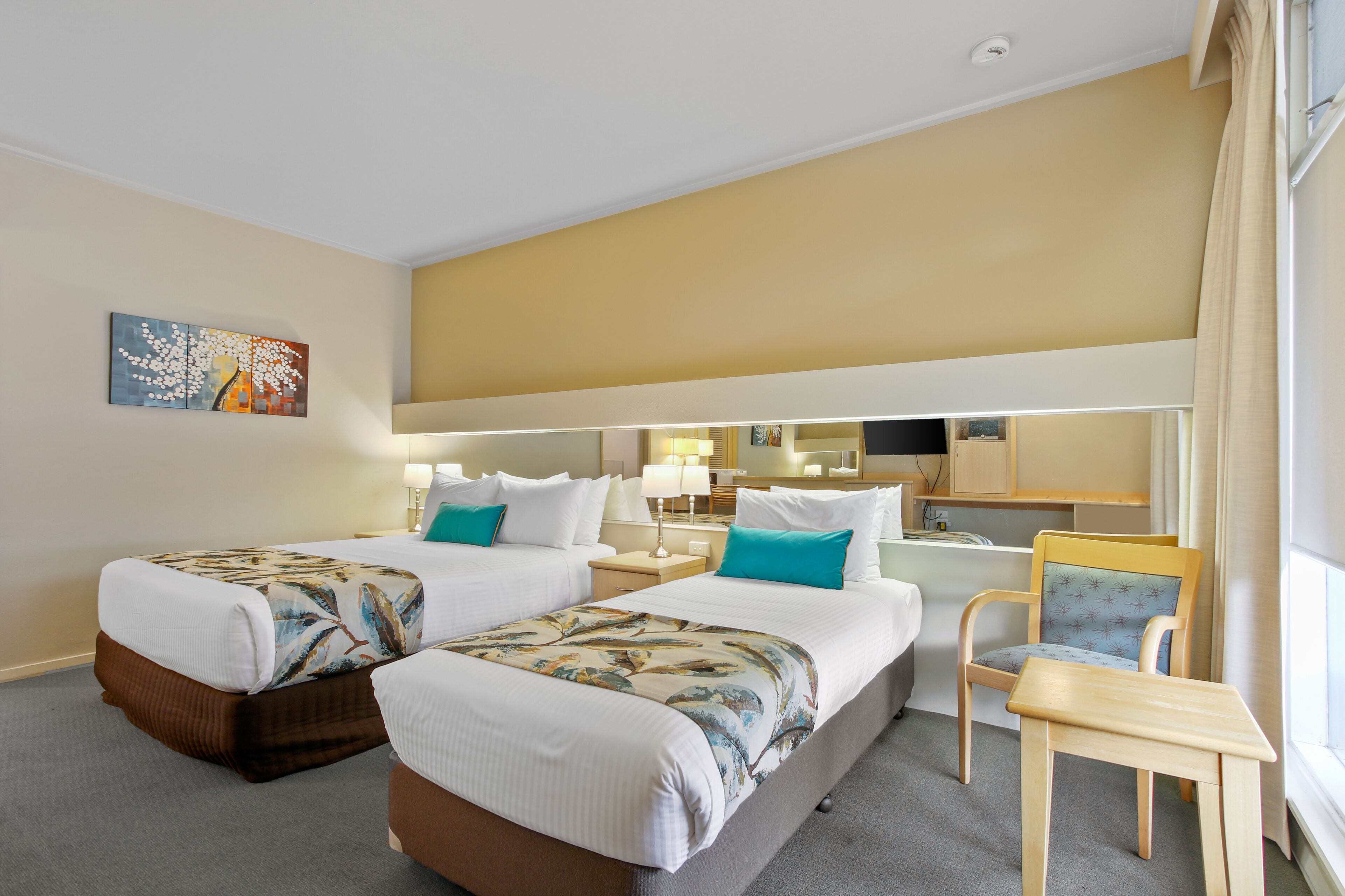 deluxe twin room | premium bedding, free minibar items, desk, blackout curtains