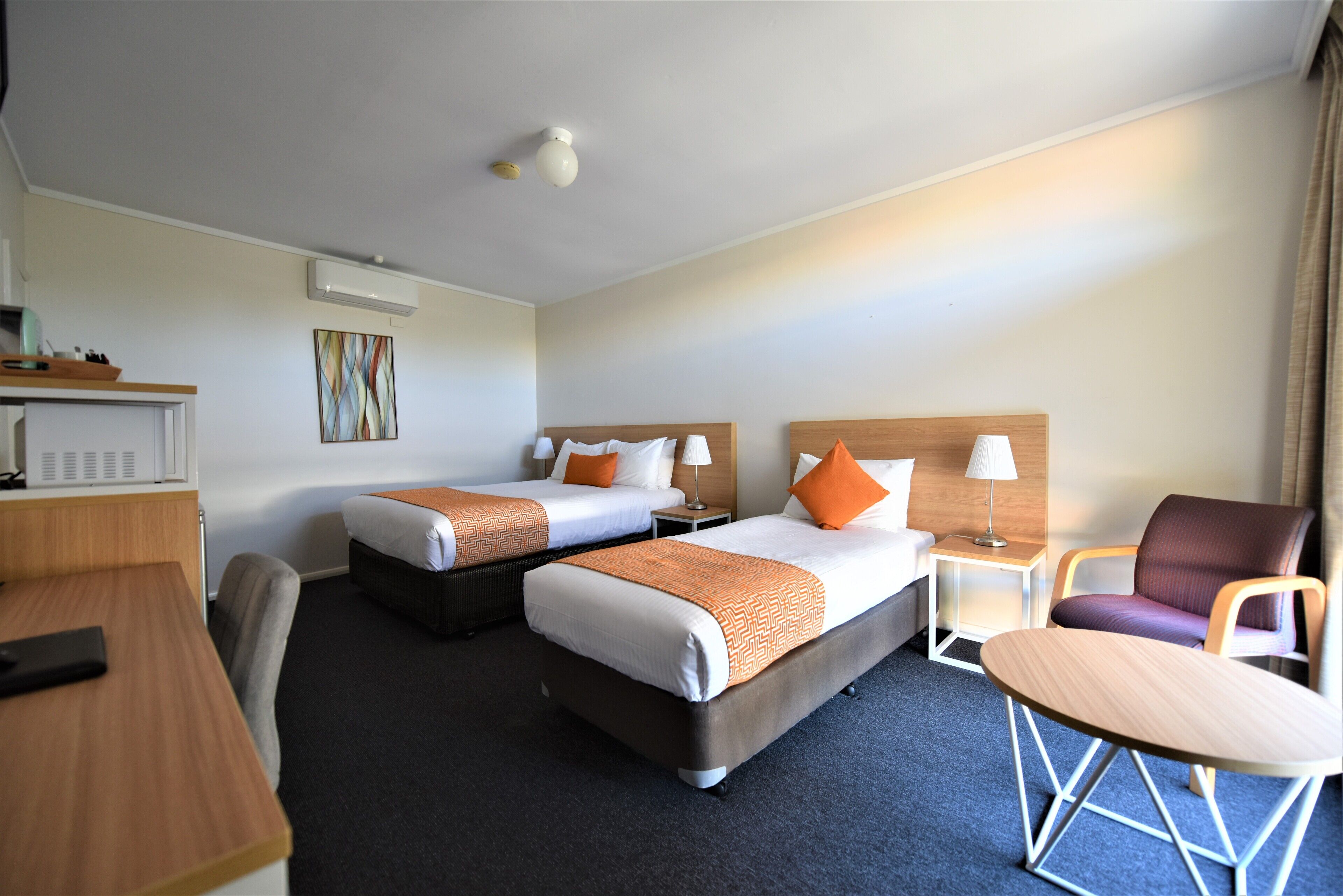 standard twin room | premium bedding, free minibar items, desk, blackout curtains