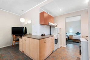Family Suite, 1 Bedroom | Premium bedding, free minibar items, desk, blackout drapes