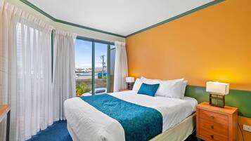 Premium bedding, free minibar items, desk, blackout drapes