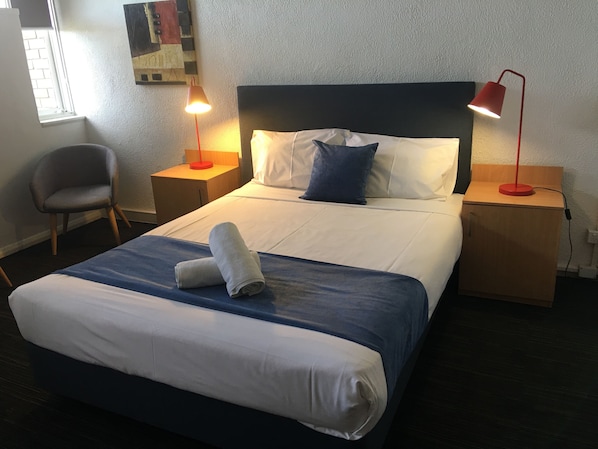 Standard Room | 1 bedroom, in-room safe, individually decorated, individually furnished