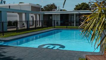 Outdoor pool, pool umbrellas, pool loungers