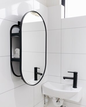 Shower, eco-friendly toiletries, hair dryer, towels
