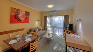 Suite, Multiple Beds, Non Smoking | Living area | 51-inch LCD TV with cable channels, pay films