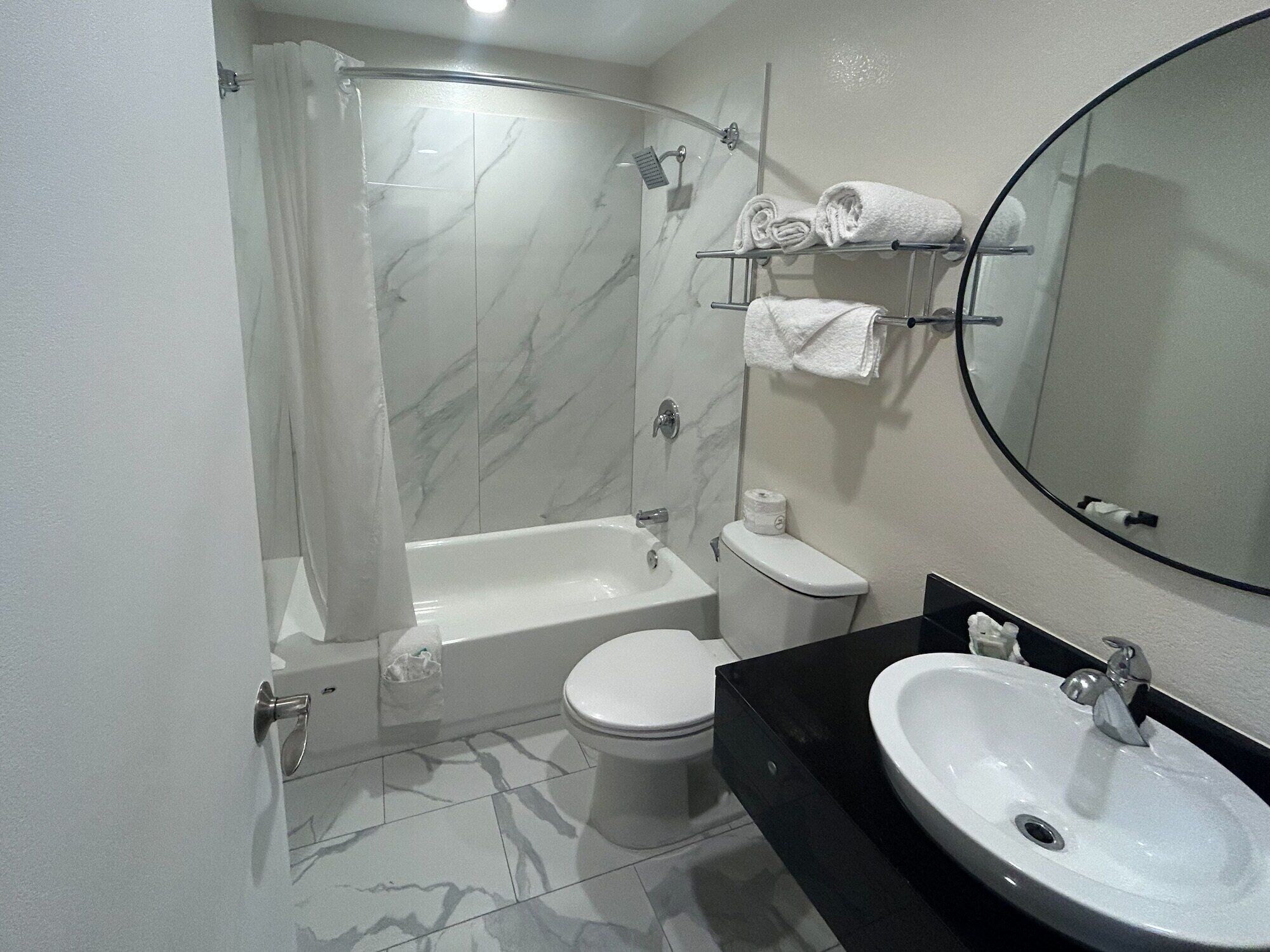 Hair dryer, towels, soap, toilet paper