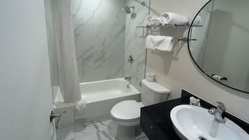 Hair dryer, towels, soap, toilet paper
