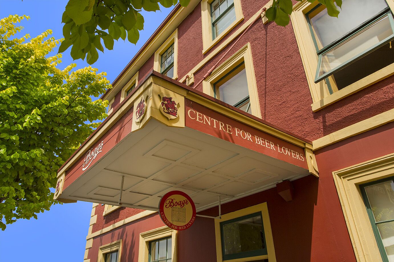 A building with a sign reading "Centre for Beer Lovers" and a logo for Boag's.