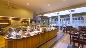 Guests can enjoy a wide selection of food and drinks at the hotel's buffet.
